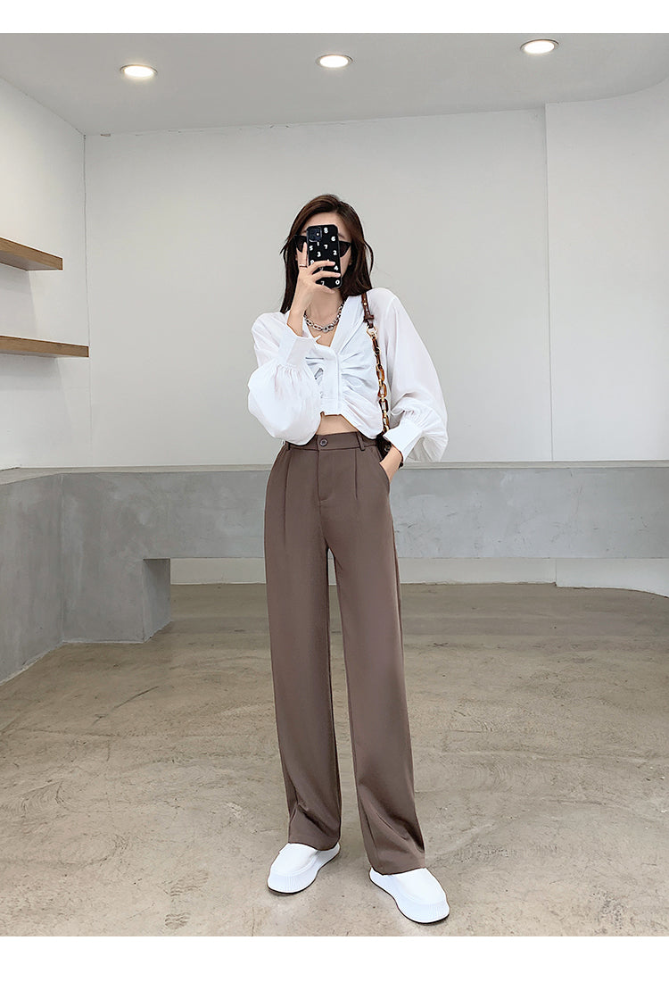 Calça feminina de cintura alta até o chão, reta e comprida
