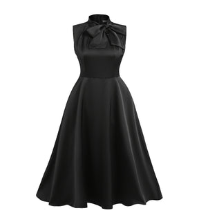 Look Quando telefone toca – Vestido midi preto com gola de laço