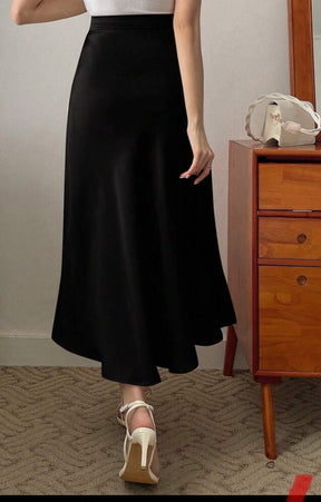 Look Quando telefone toca – Regata Gola Alta e Saia Midi
