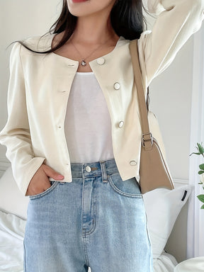 Blazer elegante de comprimento curto com mangas bufantes longas