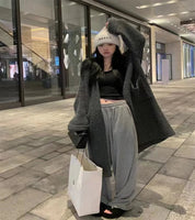 Cardigã Longo em Malha com Bolsos