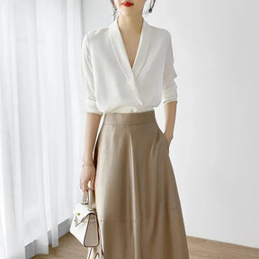 Blusa elegante em seda cetim