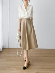 Blusa elegante em seda cetim
