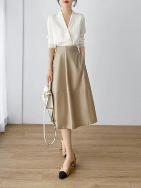 Blusa elegante em seda cetim