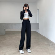 Calça feminina de cintura alta até o chão, reta e comprida