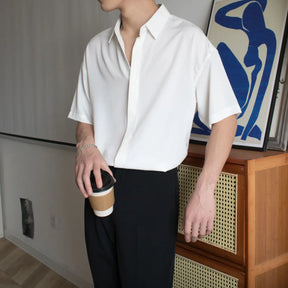 Camisa masculina lisa solta com gola