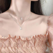Colar Feminino Dupla Camada com Pingente de Estrela e Lua – Delicadeza e Brilho em Cada Detalhe