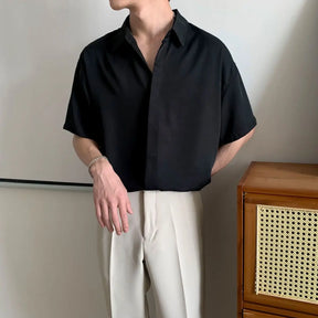 Camisa masculina lisa solta com gola