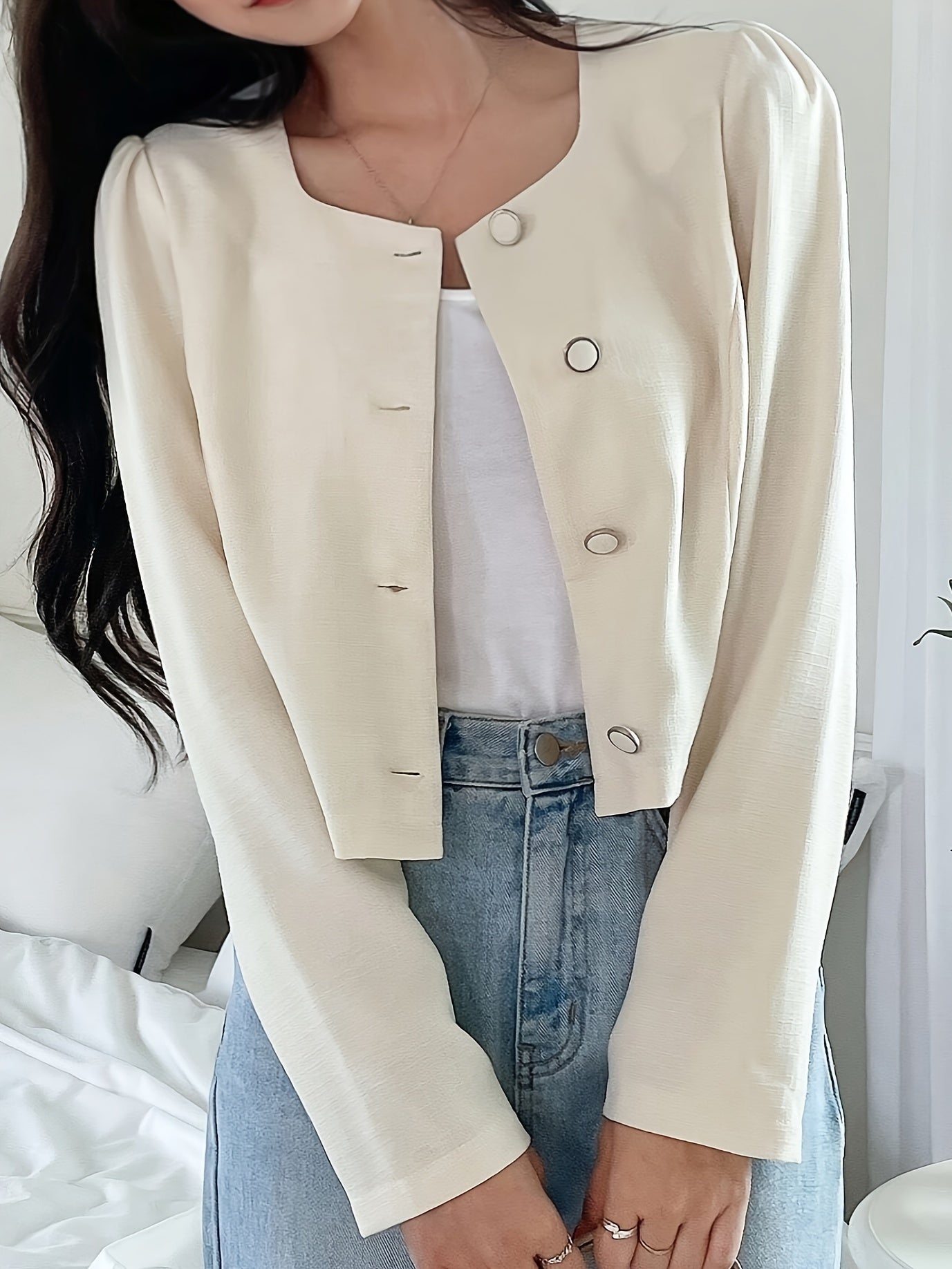 Blazer elegante de comprimento curto com mangas bufantes longas