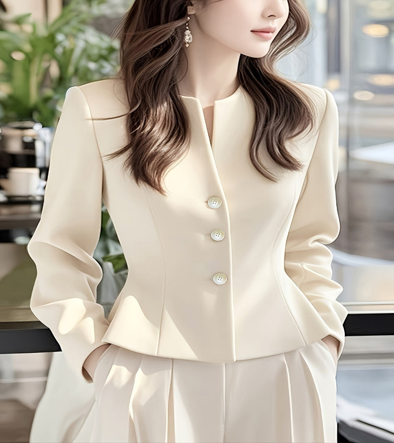 Blazer elegante com decote em V e abotoamento