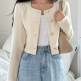 Blazer elegante de comprimento curto com mangas bufantes longas